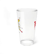 Side view of the clear pint glass showing part of the white and yellow chicken graphic on the left and a red Svengoolie splatter logo on the right.