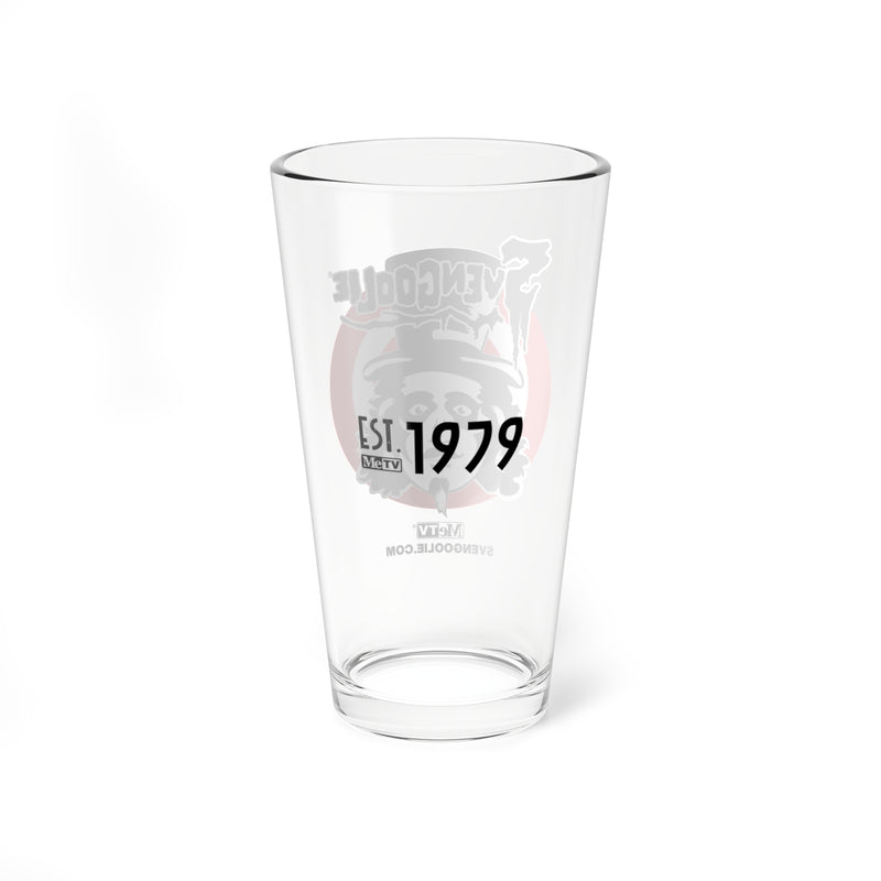 Back of the Svengoolie pint glass showing 'EST. 1979' in black over a faint, reversed logo, with 'SVENGOOLIE.COM' below.