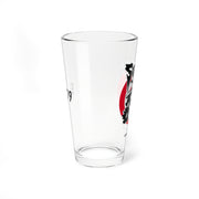 Side view of the Svengoolie pint glass showing the face logo on one side and 'EST. 1979' in black on the other.