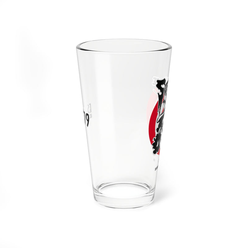 Side view of the Svengoolie pint glass showing the face logo on one side and 'EST. 1979' in black on the other.