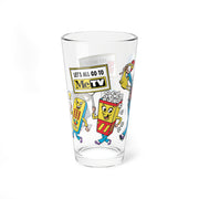 Side view of Svengoolie pint glass showing a remote control character holding a sign that reads 'LET'S ALL GO TO MeTV' beside a popcorn box character.