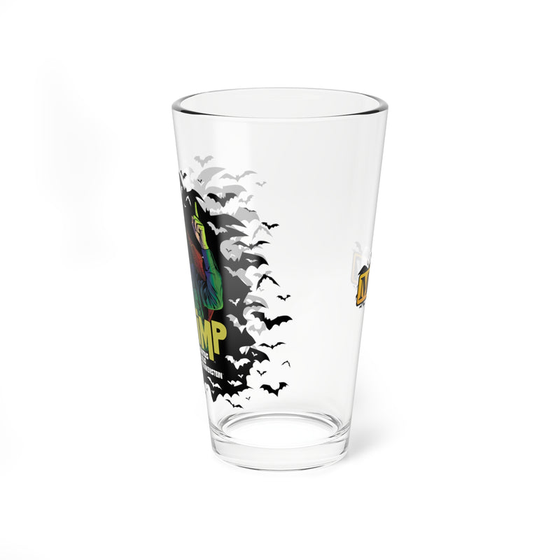 Side view of the clear IMP pint glass showing the IMP character and bats wrapping around the left side, with the yellow IMP logo on the right side.