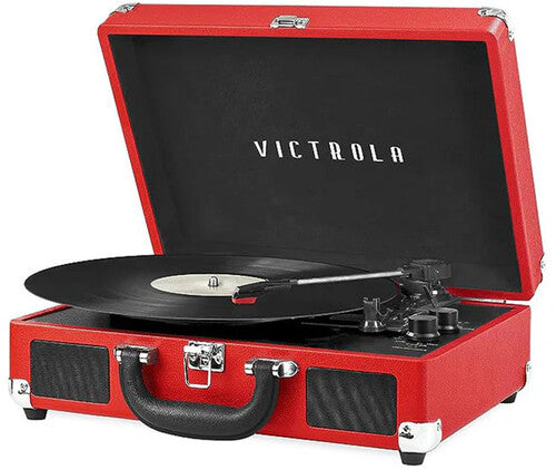 Open red suitcase-style Victrola turntable with a black vinyl record on the platter and the text 'VICTROLA' in white on the black lid.