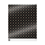 Flat sheet of Svengoolie wrapping paper showing the full repeating pattern of face logos, bats, and holly on black.