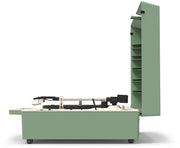 Opposite side view of basil green record player with lid open, showing the tonearm resting over the turntable and the lid's record storage shelves.
