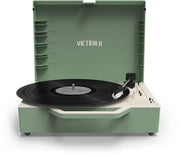 Front view of basil green record player with lid open, showing cream 'VICTROLA' text centered on the lid above the turntable.