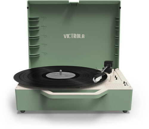 Front view of basil green record player with lid open, showing cream 'VICTROLA' text centered on the lid above the turntable.