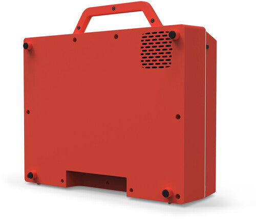 Back of the closed red suitcase record player with a white carry handle and a vented speaker grille on the rear corner.