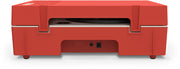 Back of the red record player showing two black power and audio jacks on the rear panel below the turntable.