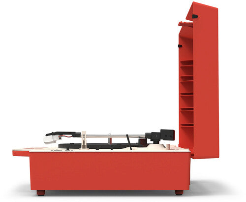 Opposite side view of the open red record player with its lid raised, showing the tonearm and the record storage shelves on the lid.