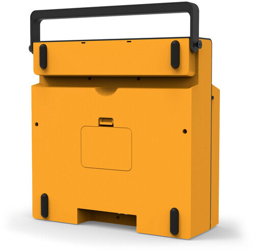 Back view of the orange Victrola Revolution GO case with a black carry handle and a recessed access cover on the rear panel.