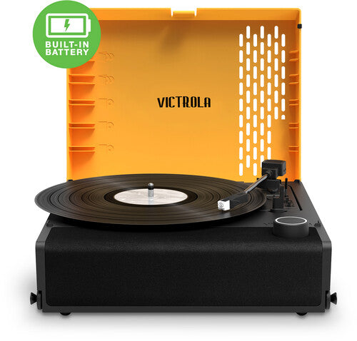 Orange and black Victrola Revolution GO portable record player with open lid featuring the Victrola logo with the text 'VICTROLA' in black on the lid, and a built-in battery badge.