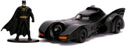 Black 1:32 scale die-cast 1989 Batmobile featuring a matching Batman figure standing beside it