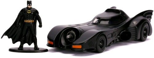 Black 1:32 scale die-cast 1989 Batmobile featuring a matching Batman figure standing beside it