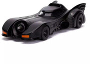 Side view of the black 1989 Batmobile die-cast model showing its rear jet exhaust and orange headlights