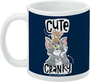 Left side of the Tom and Jerry Cute & Cranky mug with the handle on the left, showing the same design and a small copyright line below the labels.