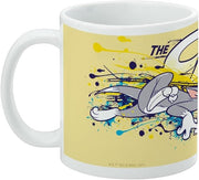 Back of the Tom and Jerry mug showing Tom leaping over blue and yellow paint splatters with 'THE' printed in navy above him.