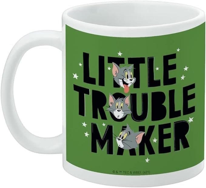 Left side of the green Tom and Jerry mug showing the same Tom faces and 'Little Trouble Maker' text, with small copyright text near the base.