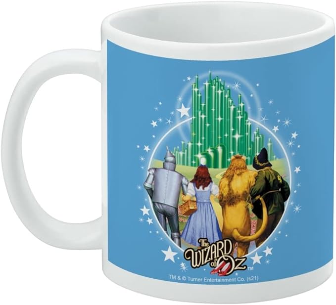 Left side view of the blue mug with its handle on the left, showing the same Emerald City design and a small copyright line along the bottom.
