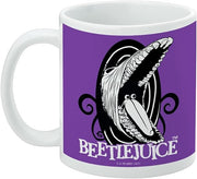 Left side of the Beetlejuice mug showing the open-mouthed monster and 'BEETLEJUICE' text, with a small copyright line at the base.