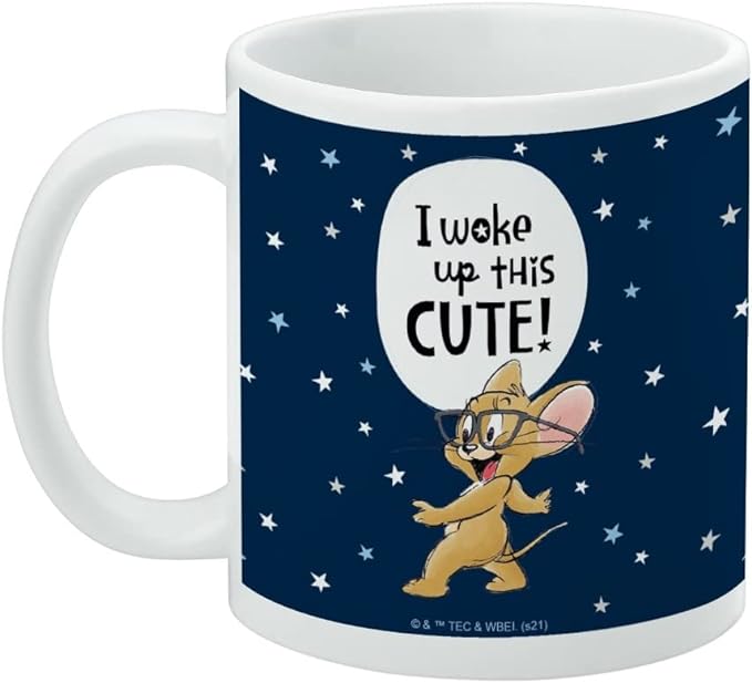 Left side of the Tom and Jerry mug showing the handle on the left and a small copyright line printed below Jerry