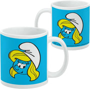 Front and back of The Smurfs Smurfette Face Mug showing the same blue Smurfette design on the front and small licensing text printed on the back.