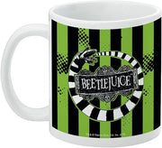 Left side of the Beetlejuice mug showing the handle and the sandworm and title logo, with a small Warner Bros. copyright line along the bottom.