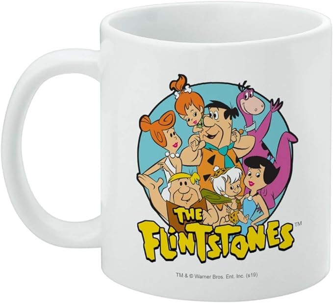 Mug with handle on the left showing the same Flintstones group design, with a small Warner Bros. copyright line beneath the logo.