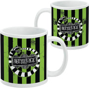 Front and back of the white Beetlejuice mug, with the sandworm and title banner on the front and the Warner Bros. copyright line printed on the back.