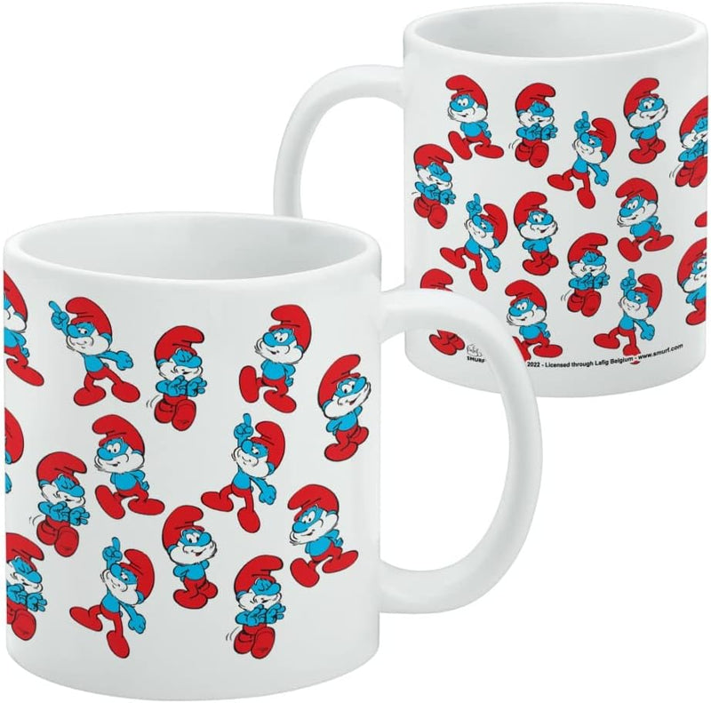 Front and back of the white mug showing the same repeating Papa Smurf pattern, with small licensing text on the back.