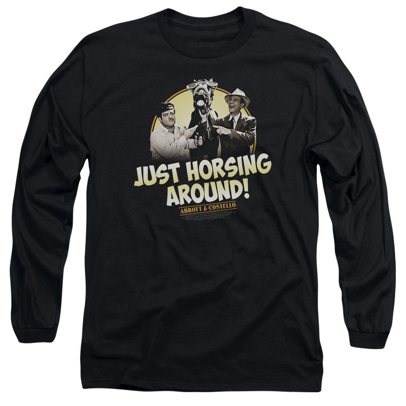 Black long-sleeve shirt featuring a vintage photo of Abbott & Costello with a horse in a yellow circle, with the text 'JUST HORSING AROUND!' in cream below it.
