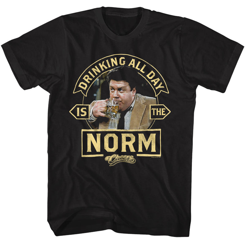 Black short-sleeved t-shirt featuring Norm from Cheers with a beer mug and the text 'DRINKING ALL DAY IS THE NORM' in gold.