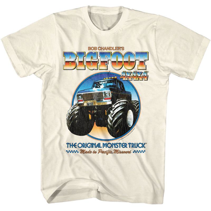 Cream short-sleeved t-shirt featuring a circular illustration of the Bigfoot monster truck with the text 'BIGFOOT' above it.