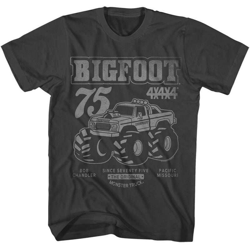 Charcoal short-sleeved t-shirt featuring a gray cartoon Bigfoot monster truck with oversized tires with the text 'BIGFOOT' and '75' in gray above it.