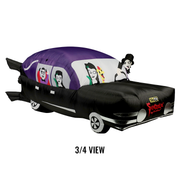 Left three-quarter view of inflatable hearse yard decoration with Svengoolie driving and the Sven Squad inside.