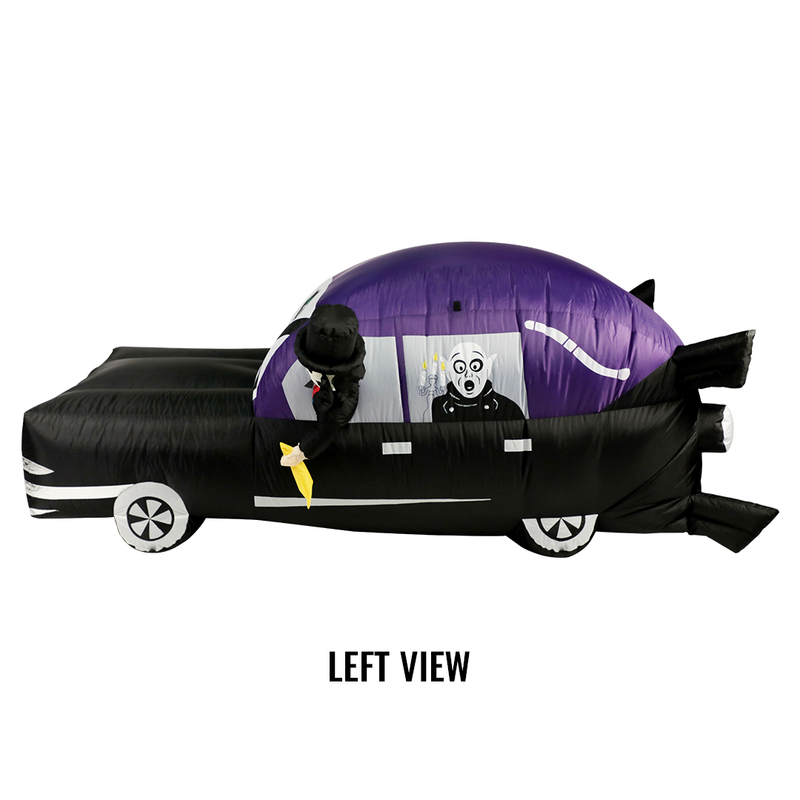 Left side view of inflatable hearse yard decoration with Svengoolie driving and the Sven Squad inside.