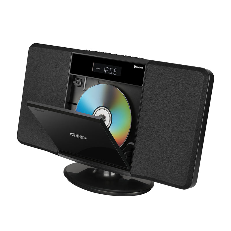 Angled view of the black Jensen music system with its CD tray open and a disc loaded inside.
