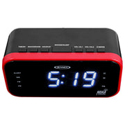 Front view of the black and red Jensen clock radio showing a blue LED display and control buttons along the top edge.