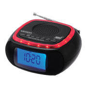 Angled view of black Jensen alarm clock radio with red LED alert ring and blue display showing 10:20 AM, with the Jensen logo in silver on the top left.