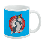 Blue mug featuring Tom from Tom and Jerry with a hand raised to his face in front of red concentric circles.