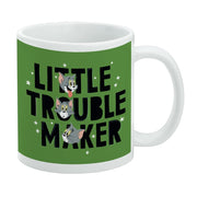 Angled view of green ceramic mug featuring three Tom cat faces stacked above the text 'Little Trouble Maker' in black lettering.