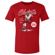 Red t-shirt featuring Chris Chelios skating on ice with a hockey stick and the text 'Chris Chelios' in red script above him.