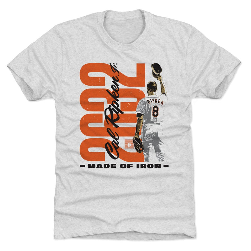 Light heather gray t-shirt featuring Cal Ripken Jr. in front of large orange 2632 numbers, with the text 'Made of Iron' in black below.