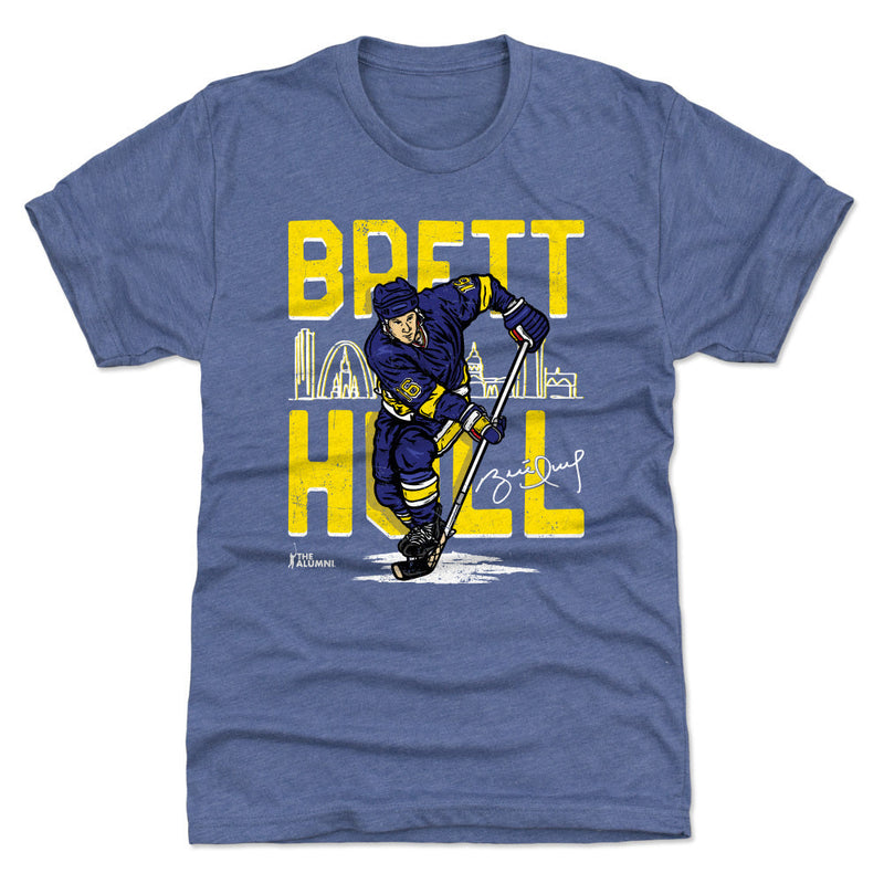 Royal blue t-shirt featuring a cartoon of Brett Hull in a blue and yellow hockey jersey with the text 'BRETT HULL' and the St. Louis skyline in yellow.