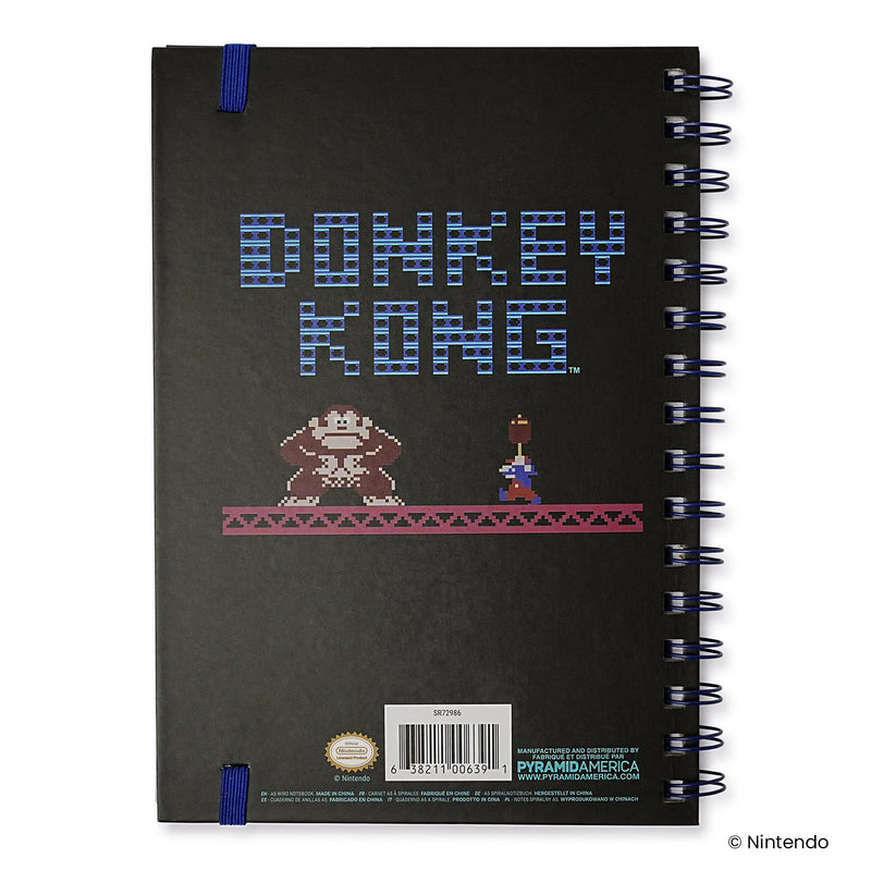 Back cover of the notebook featuring the text 'DONKEY KONG' in blue pixel letters above pixel art of Donkey Kong and Mario on a girder.
