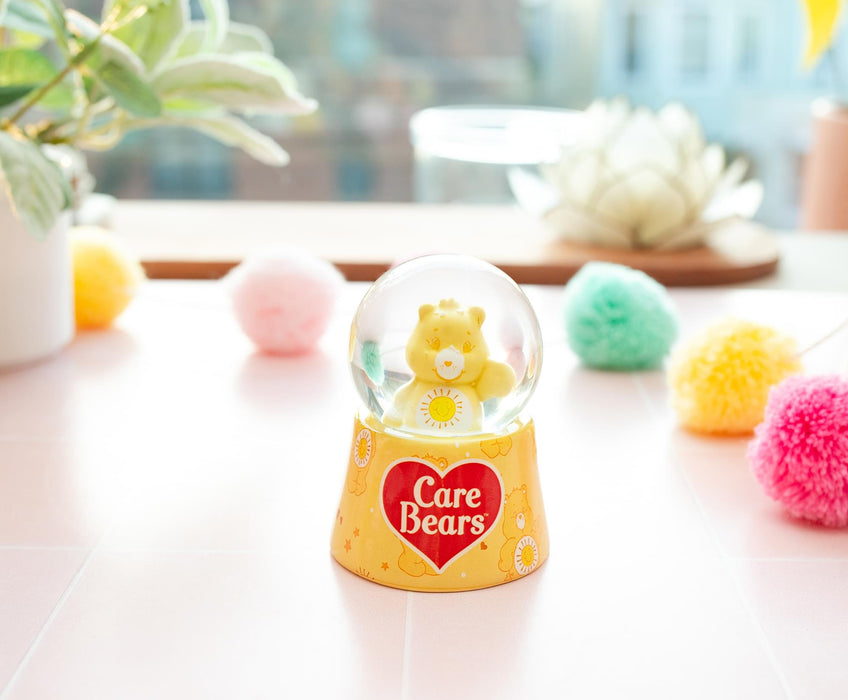 Care Bears - Funshine Bear Mini Light-Up Snow Globe | 3 Inches Tall