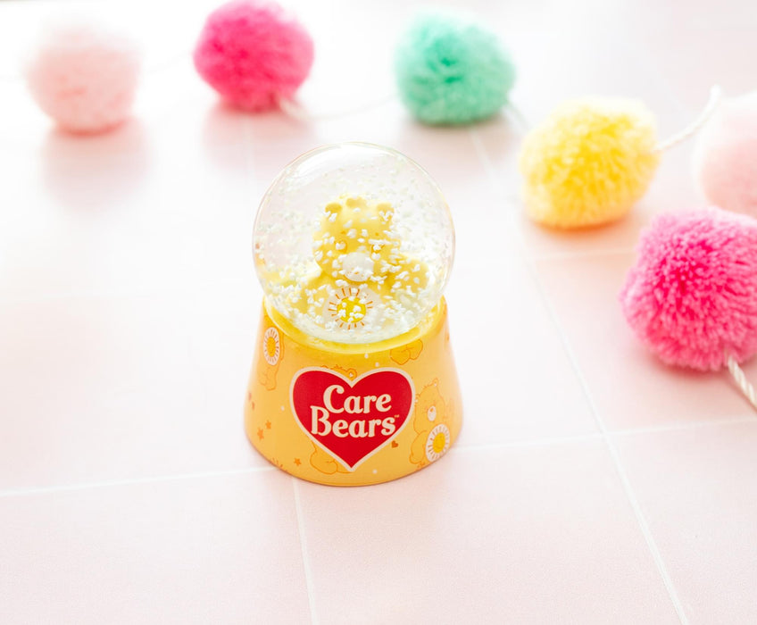 Care Bears - Funshine Bear Mini Light-Up Snow Globe | 3 Inches Tall