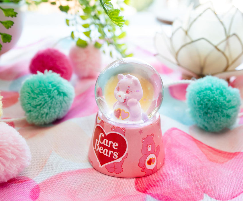 Care Bears - Love-A-Lot Bear Mini Light-Up Snow Globe | 3 Inches Tall