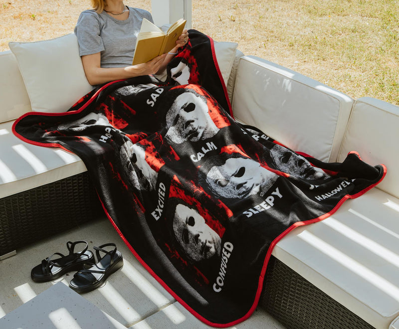 Halloween II "The Faces Of Michael Myers" Raschel Throw Blanket | 45 x 60 Inches