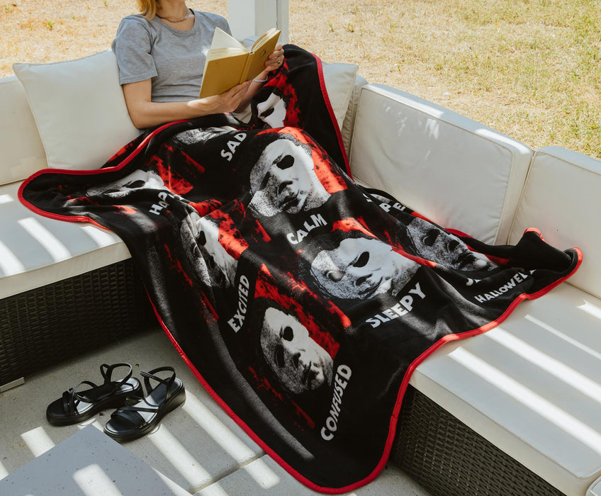 Halloween II "The Faces Of Michael Myers" Raschel Throw Blanket | 45 x 60 Inches